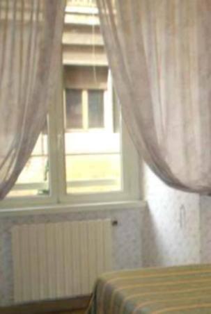 Camera Matrimoniale/Doppia con Letti Singoli con Bagno in Comune